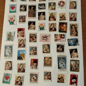 SET, de 50 estampillas USADAS, de los estados Unidos de America diferentes figuras navideñas